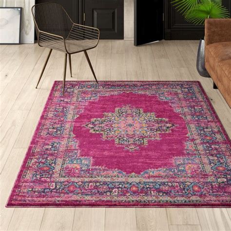 persian inspired navy and pink area rug